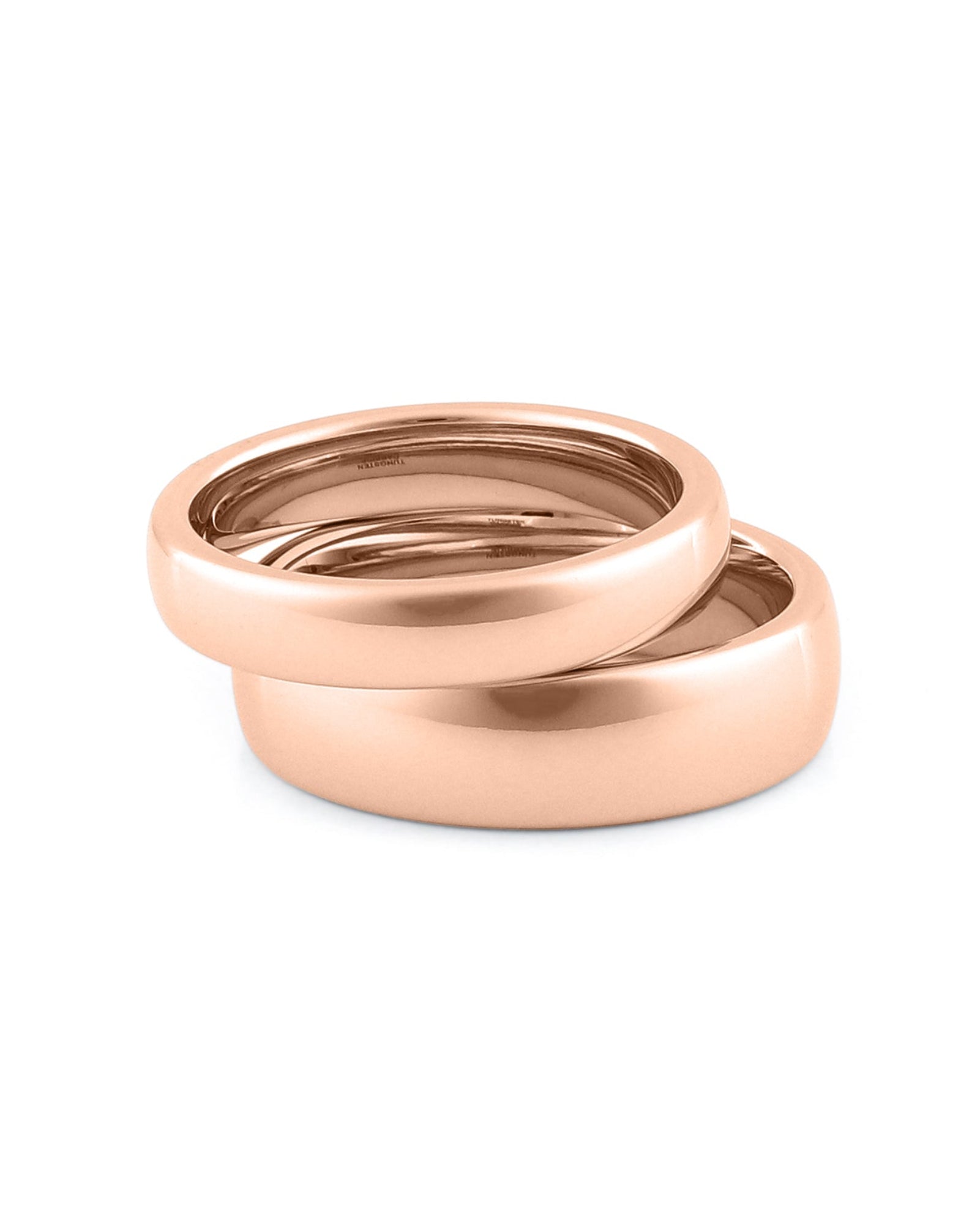 Set of matching rose gold wedding rings for engaged couples, polished and durable