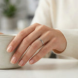woman wearing a 2mm polished tungsten wedding band