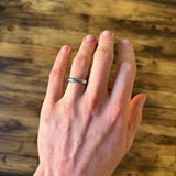 4mm polished tungsten wedding band on hand