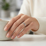 female model wearing a 4mm tungsten wedding band polished