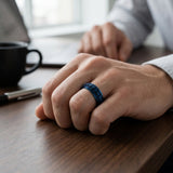 man wearing a blue dragon scale spinner ring 8mm 
