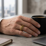 gold dragon scale spinner ring on finger