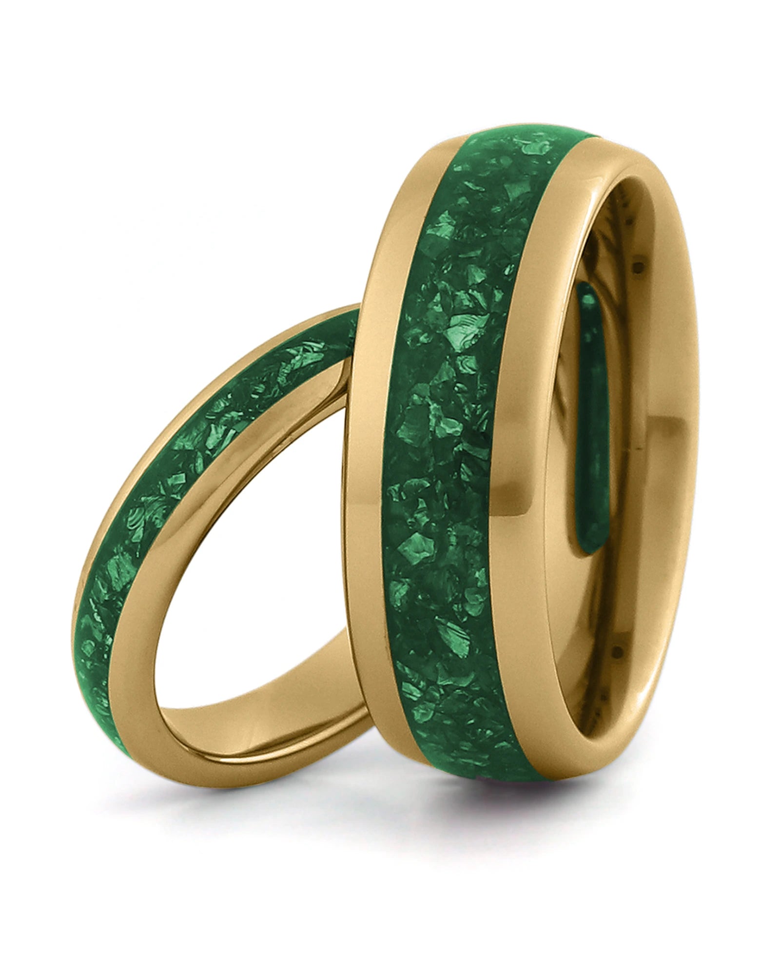 Matching gold tungsten wedding rings with emerald inlays, including an 8mm band