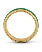 Side view of gold 8mm tungsten wedding ring with emerald inlay