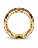 Side profile of gold guitar string wedding band showing the wood inlay and polished edges