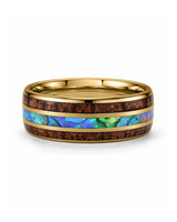 Koa wood and abalone shell tungsten ring lying flat showing the inlay detail