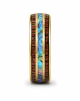 Side profile of koa wood and abalone shell tungsten ring showing the band width