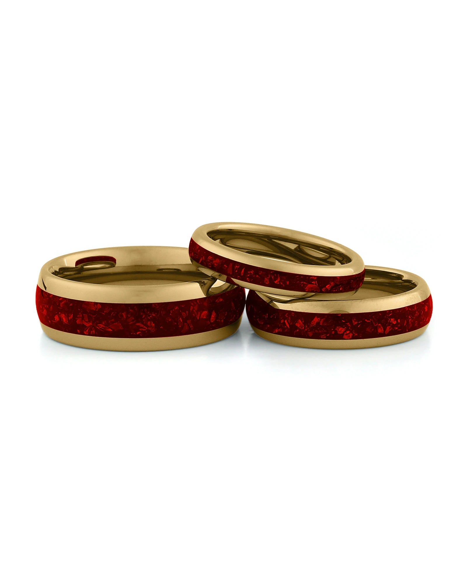Gold ruby tungsten couples wedding ring set shown together
