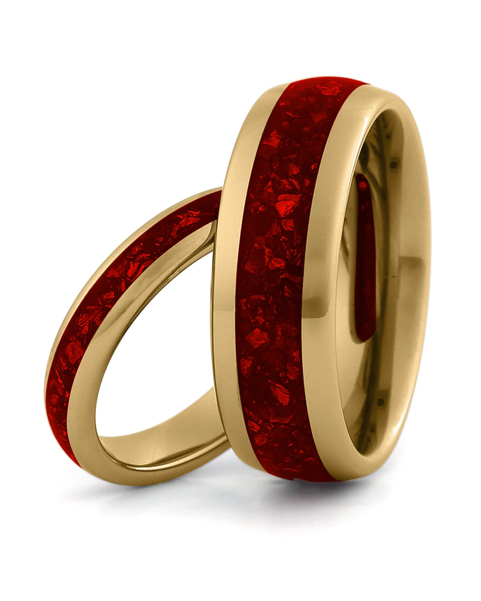 Matching gold tungsten wedding rings with ruby inlays, including an 8mm band