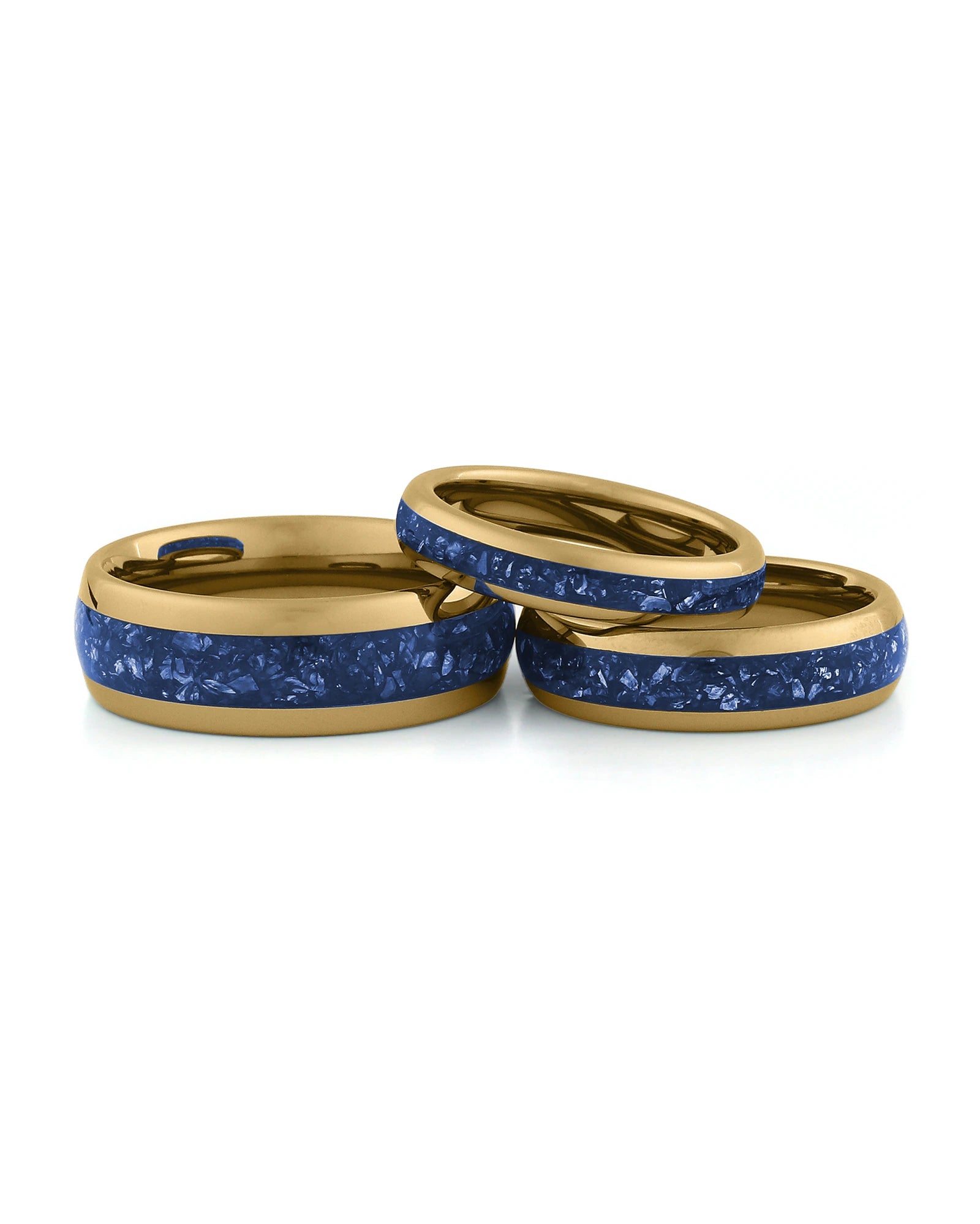 Gold sapphire tungsten couples wedding ring set shown together