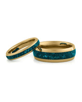 Matching gold wedding bands with turquoise stone inlays