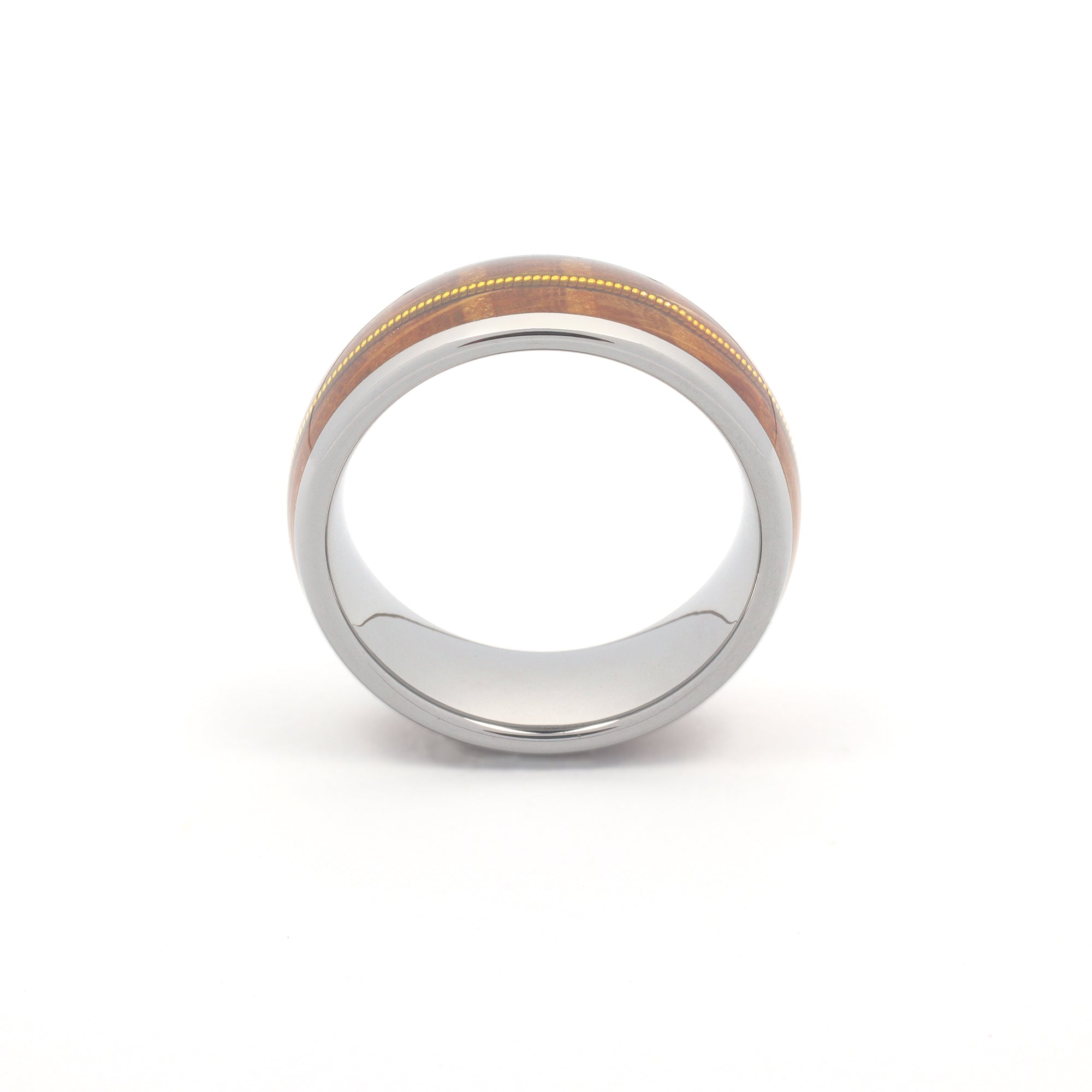 a side view showing a silver tungsten ring with an inlay of wood and guitar strings