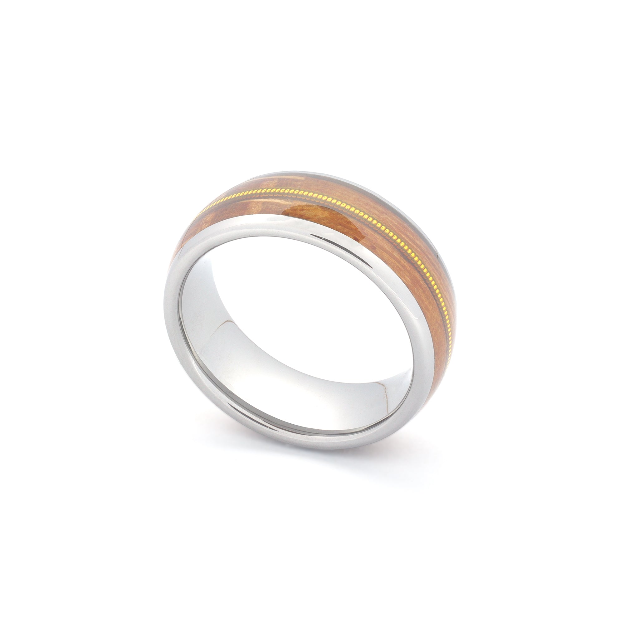 close up of a silver guitar string wedding band 