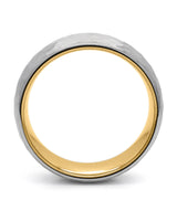 Side view of silver and gold hammered tungsten wedding ring