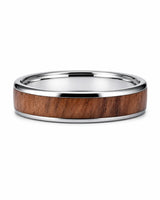 Men’s silver and reddish-brown wood inlay ring lying flat on a white studio background.