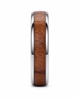 Side profile of a men’s ring featuring a reddish-brown wood inlay and polished silver edges.