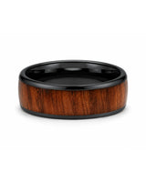 Men’s black and reddish-brown wood inlay ring lying flat on a white studio background.