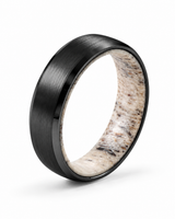 Men’s black tungsten wedding ring with brushed finish and natural antler inner sleeve