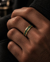 Man wearing a 6mm gold tungsten wedding ring with a natural green moss agate inlay.