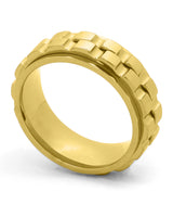 Gold men's spinner ring shown at an angle