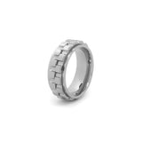silver spinning ring for men with gear design on white background