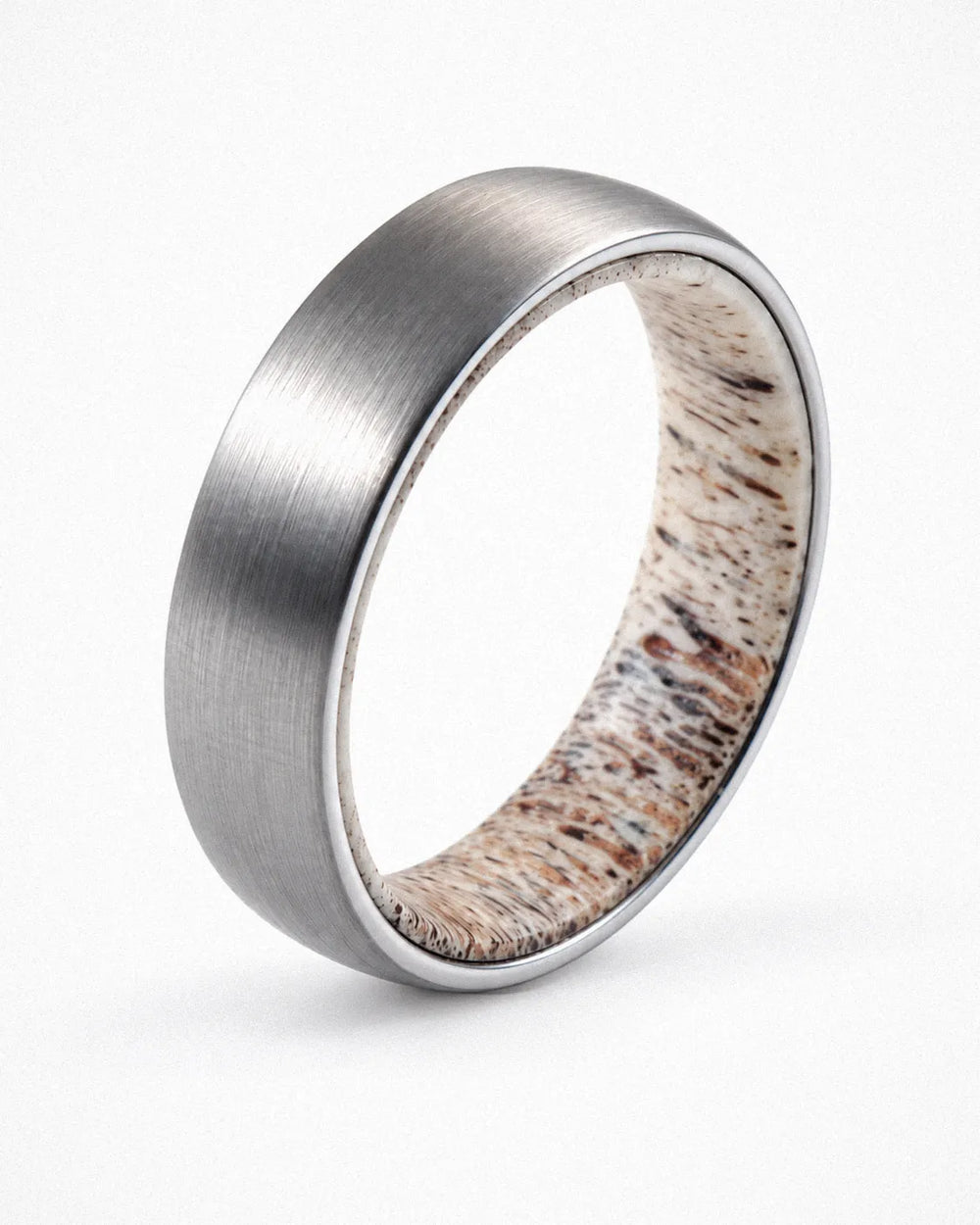 Men’s brushed silver tungsten wedding ring with natural antler inner sleeve