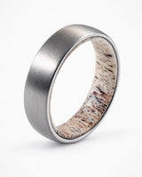 Men’s brushed silver tungsten wedding ring with natural antler inner sleeve