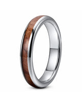 Men’s polished silver ring with a reddish-brown wood inlay, standing upright on a white background.