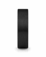 Angled view of a men's black tungsten wedding band with a real whiskey barrel wood inlay.