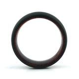 Side profile of an 8mm men's black tungsten wedding band with a real rosewood inlay.