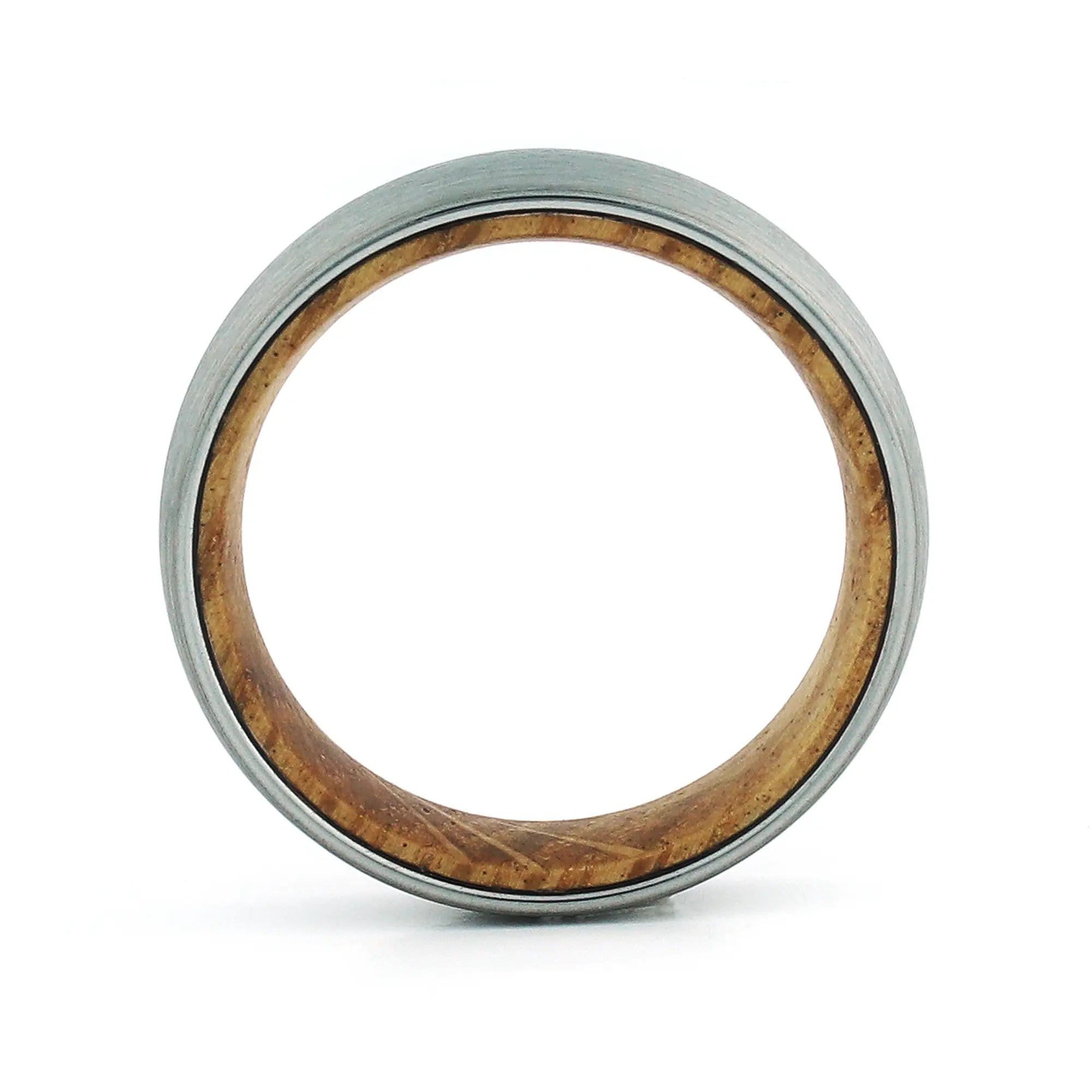Side profile of a men's brushed tungsten wedding band with a real whiskey barrel wood inlay.