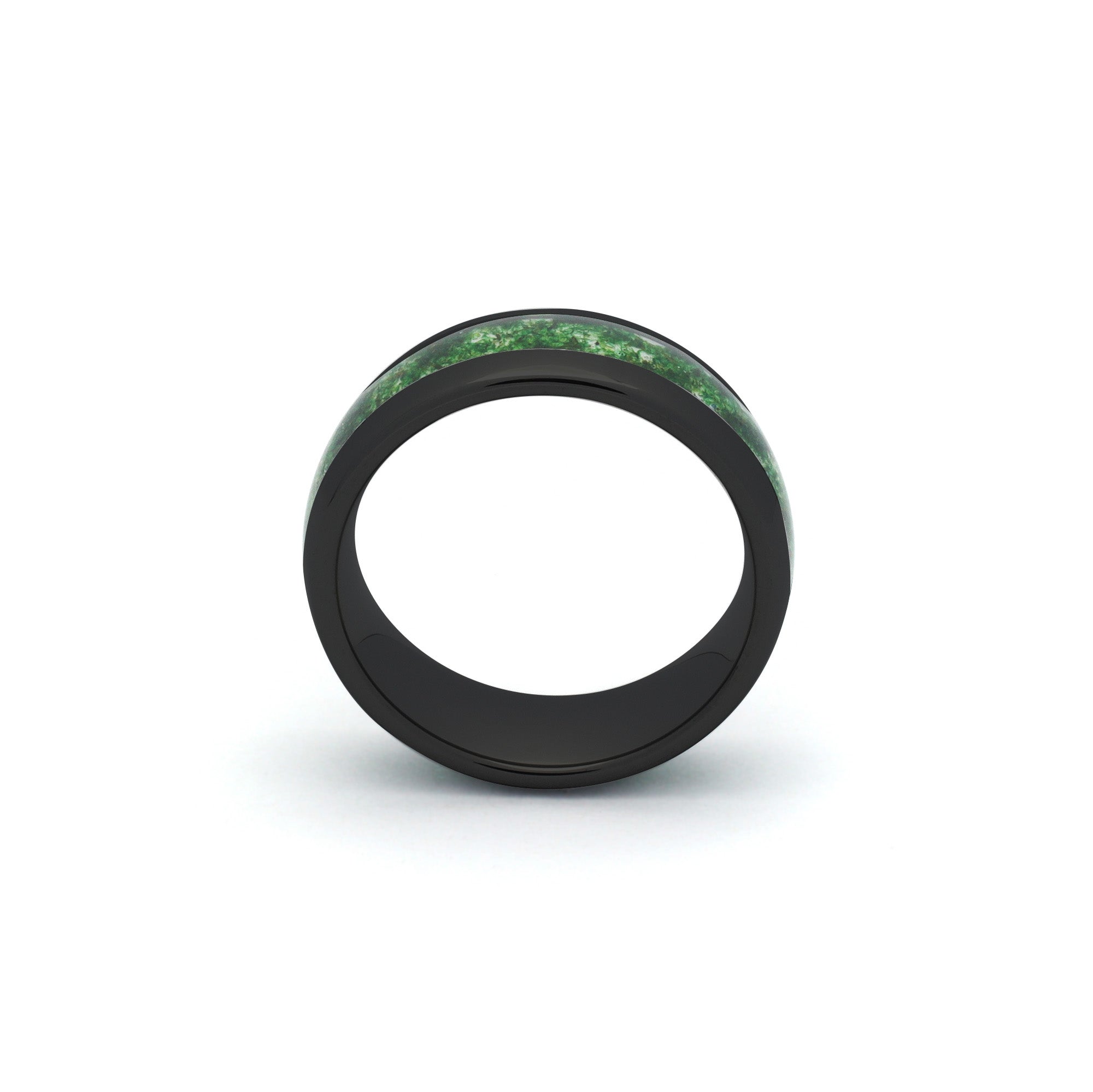 Close-up of an 8mm black band with natural moss agate stone, displayed against a white backdrop.
