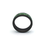 Close-up of an 8mm black band with natural moss agate stone, displayed against a white backdrop.