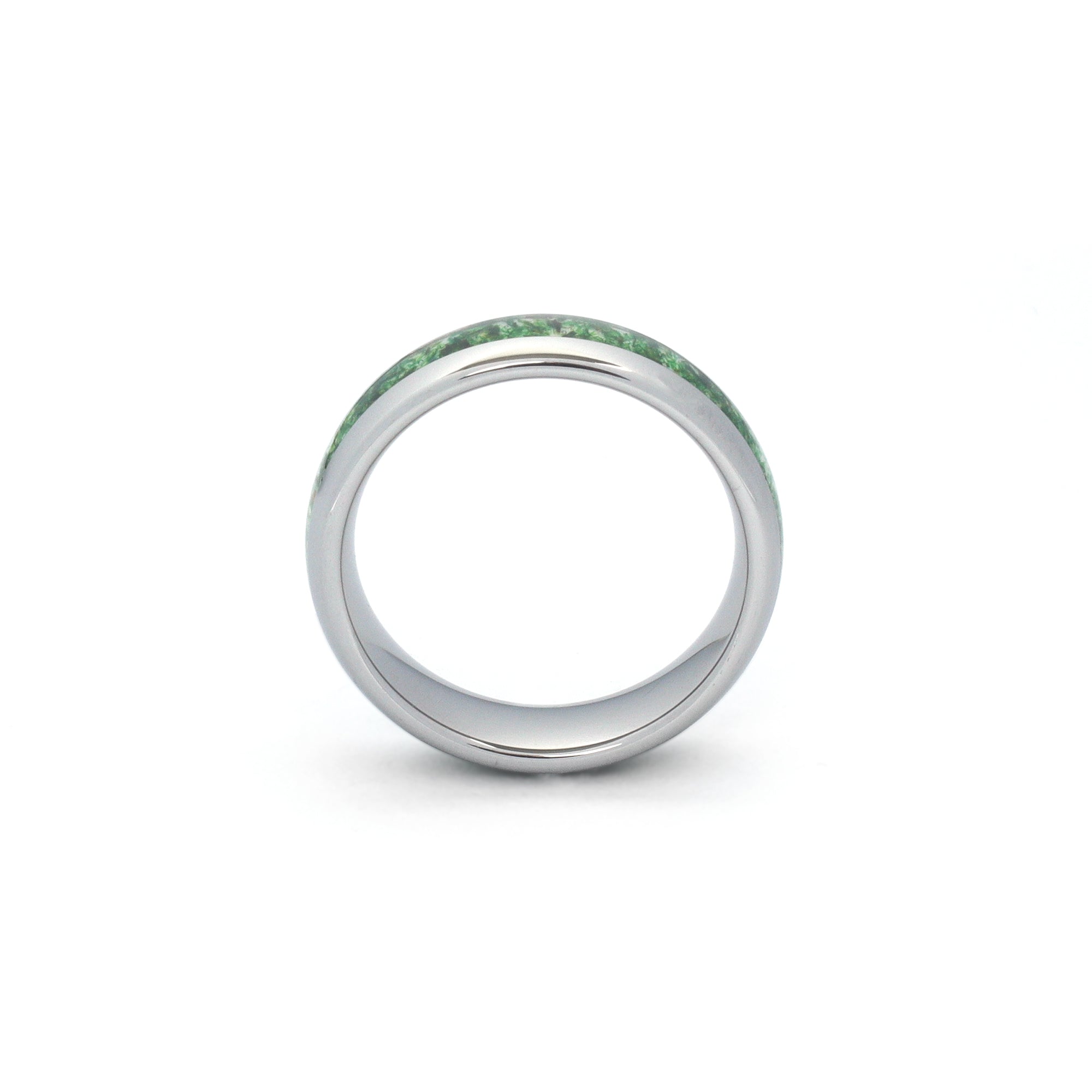close-up of natural green moss agate wedding ring with polished tungsten band