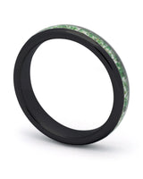 Black 4mm tungsten ring with moss agate inlay shown at an angle