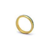 Nature inspired engagement ring featuring 4mm gold and green moss agate band