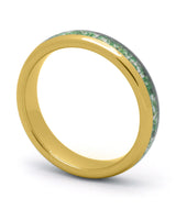 Gold 4mm tungsten ring with moss agate inlay shown at an angle