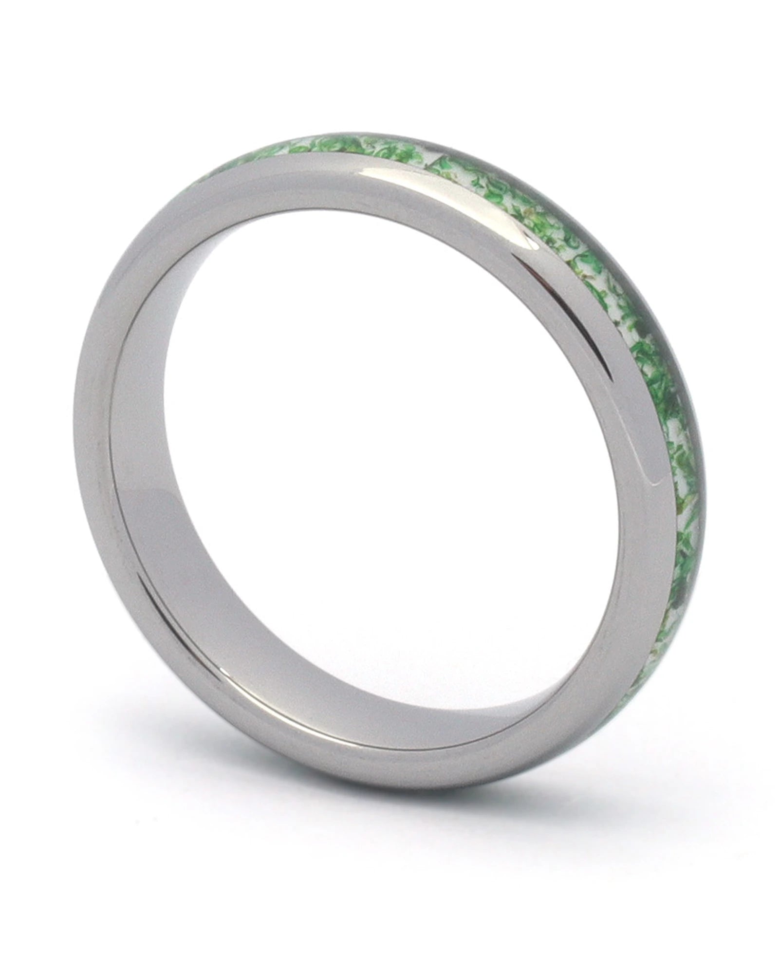 Silver 4mm tungsten ring with moss agate inlay shown at an angle