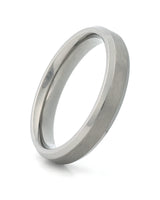 A brushed metal band ring, likely titanium or tungsten, shown at an angle on a clean white background.