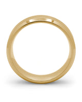 Side view of gold Oblique titanium wedding ring