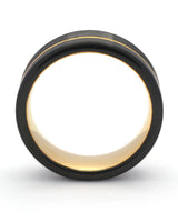 Side view of black and gold Offset wedding ring