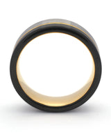 Side view of silver, black and gold Offset wedding ring