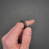 stylish black anxiety ring with smooth spinning gears