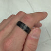 celtic black spinner fidget ring being spun on finger