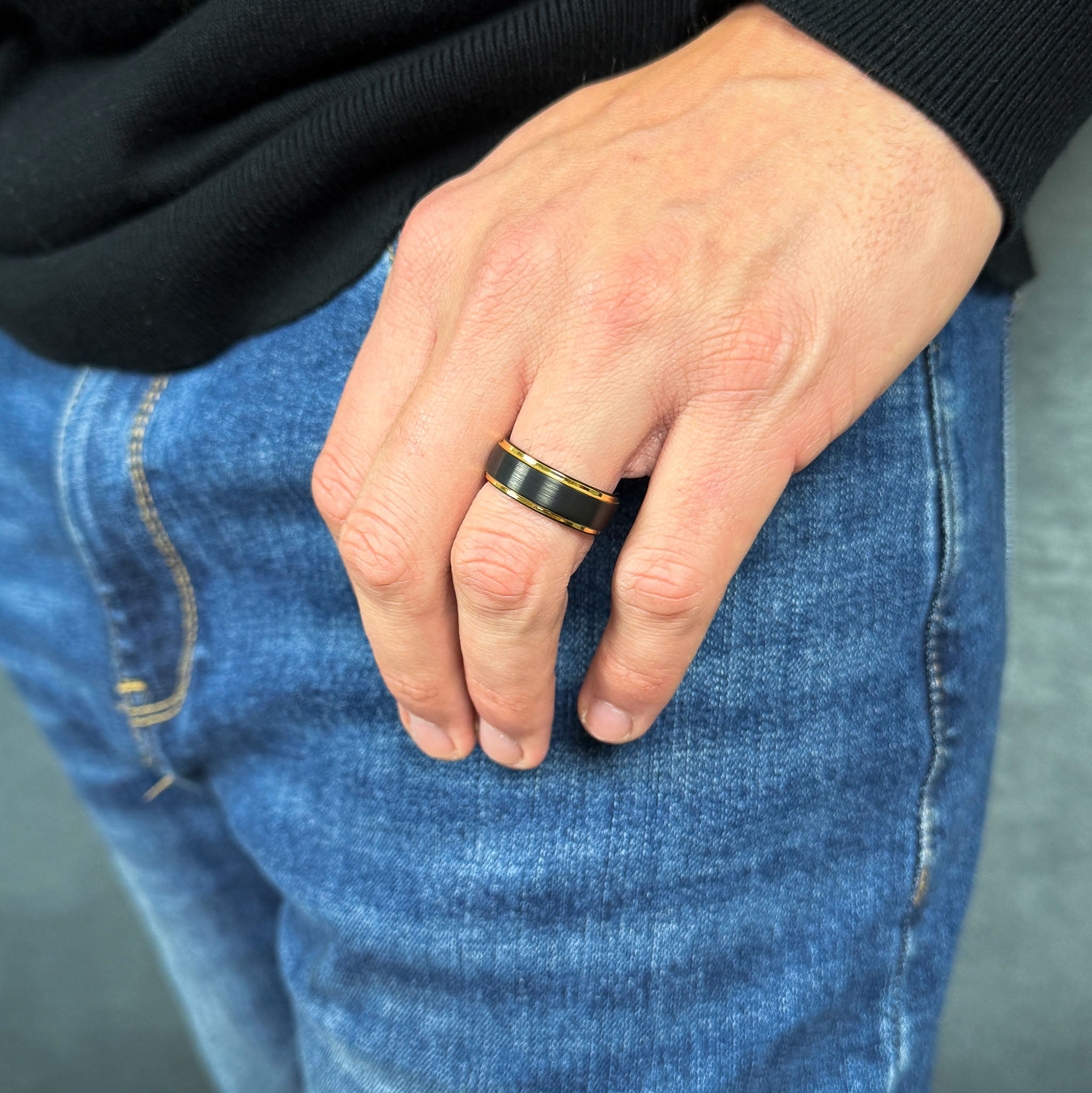 mens black brushed tungsten ring with polished gold beveled edges