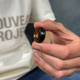 black brushed tungsten ring with a rose gold polished sleeve