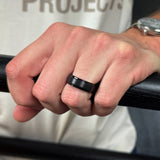 black brushed tungsten ring with a rose gold polished sleeve