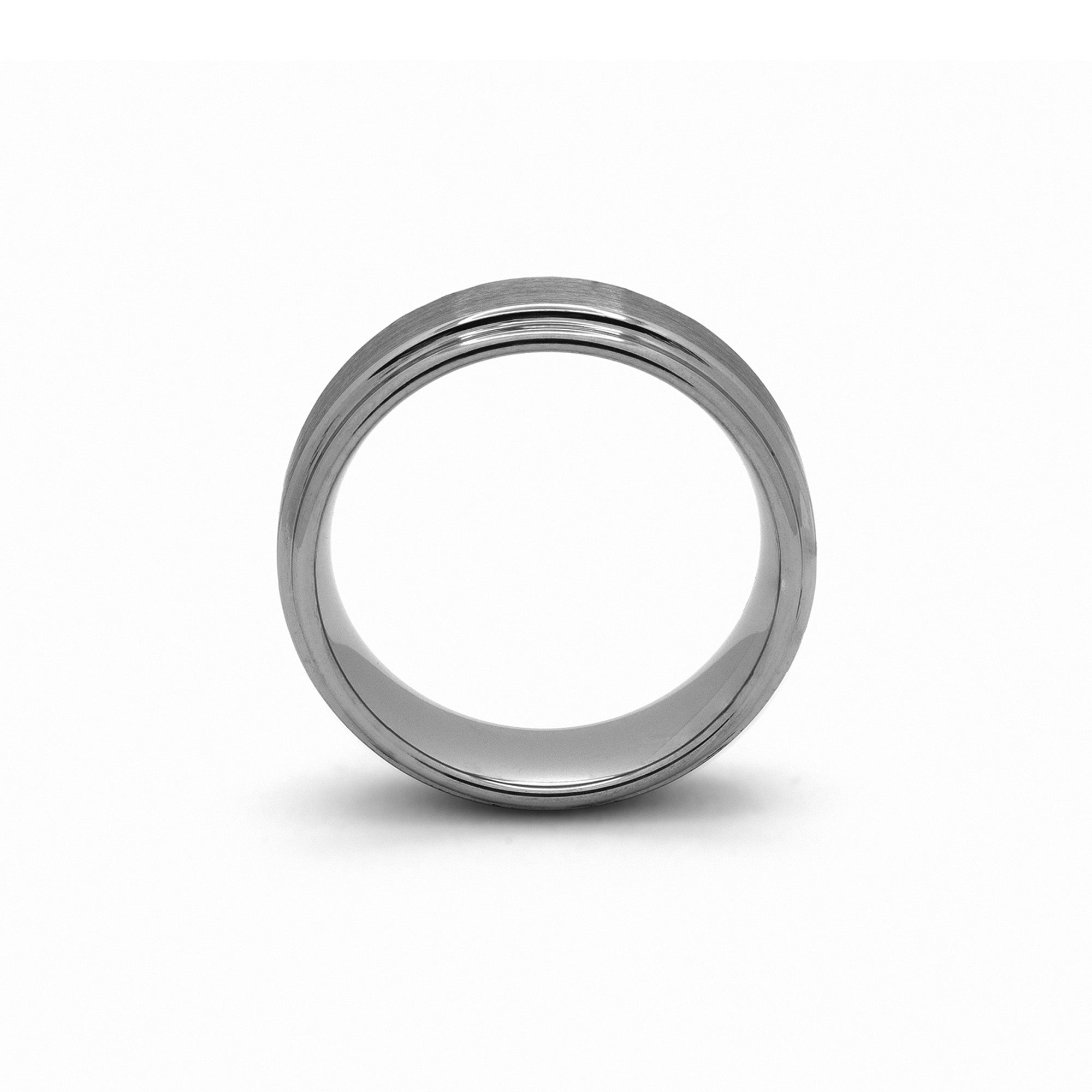 Close-up of gunmetal grey men’s ring featuring scratch-proof brushed finish