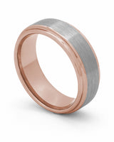 Silver and rose gold Ridge tungsten wedding ring shown at an angle