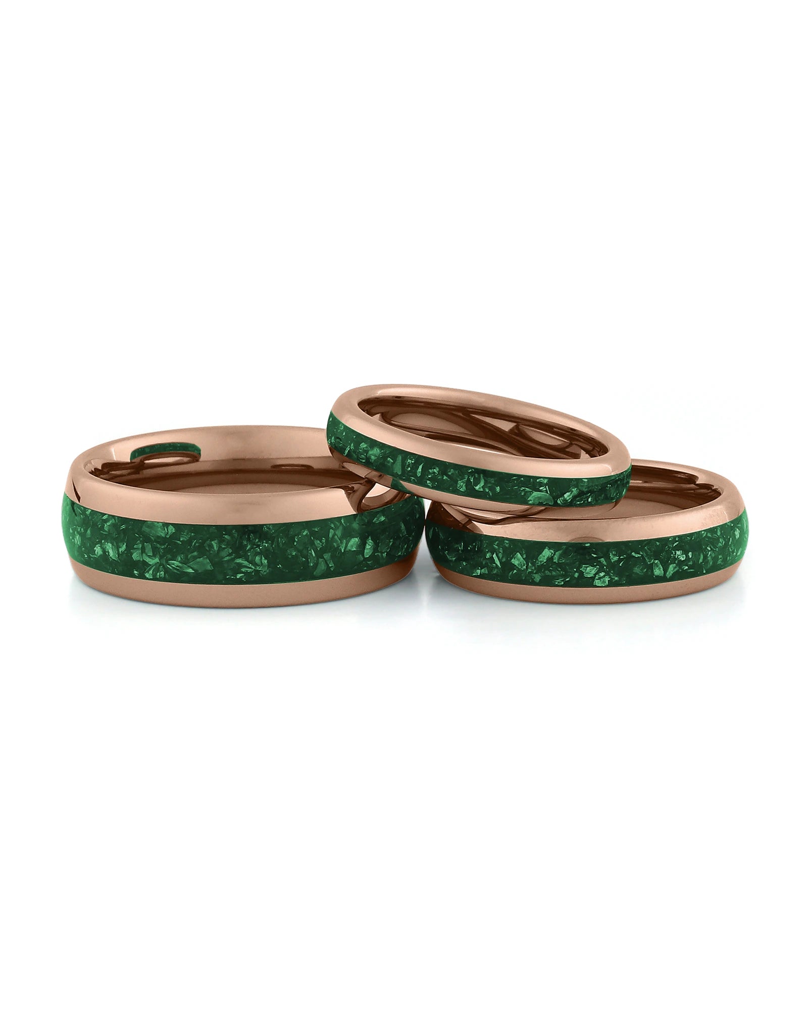 Rose gold emerald tungsten couples wedding ring set shown together